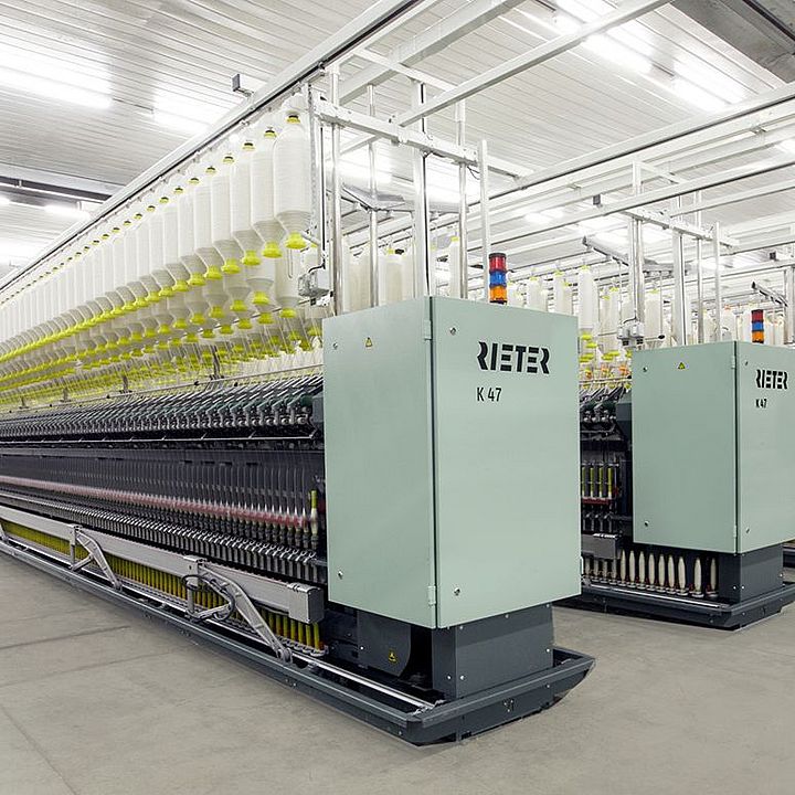 Compact-spinning machine K 47 – spinning room with several K 47 machines