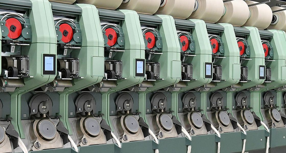 Rotor spinning machine R 70, in focus several spinning boxes