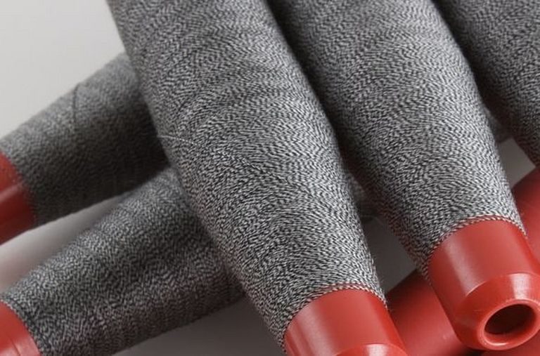 Cops with spin-twisted yarn (twin yarn)